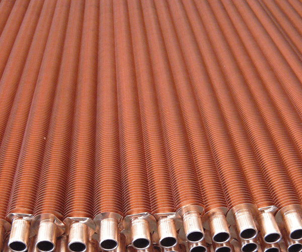 Photo of a batch of copper 'G' fin ribbon wound tube.